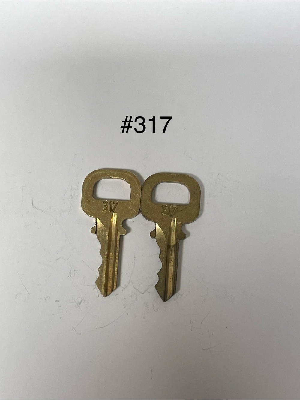 Pair of Louis Vuitton #317 Gold Keys